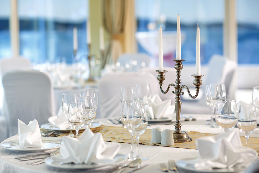 Royal Ariston Hotel Dubrovnik Bagian luar foto A table set for a formal dinner